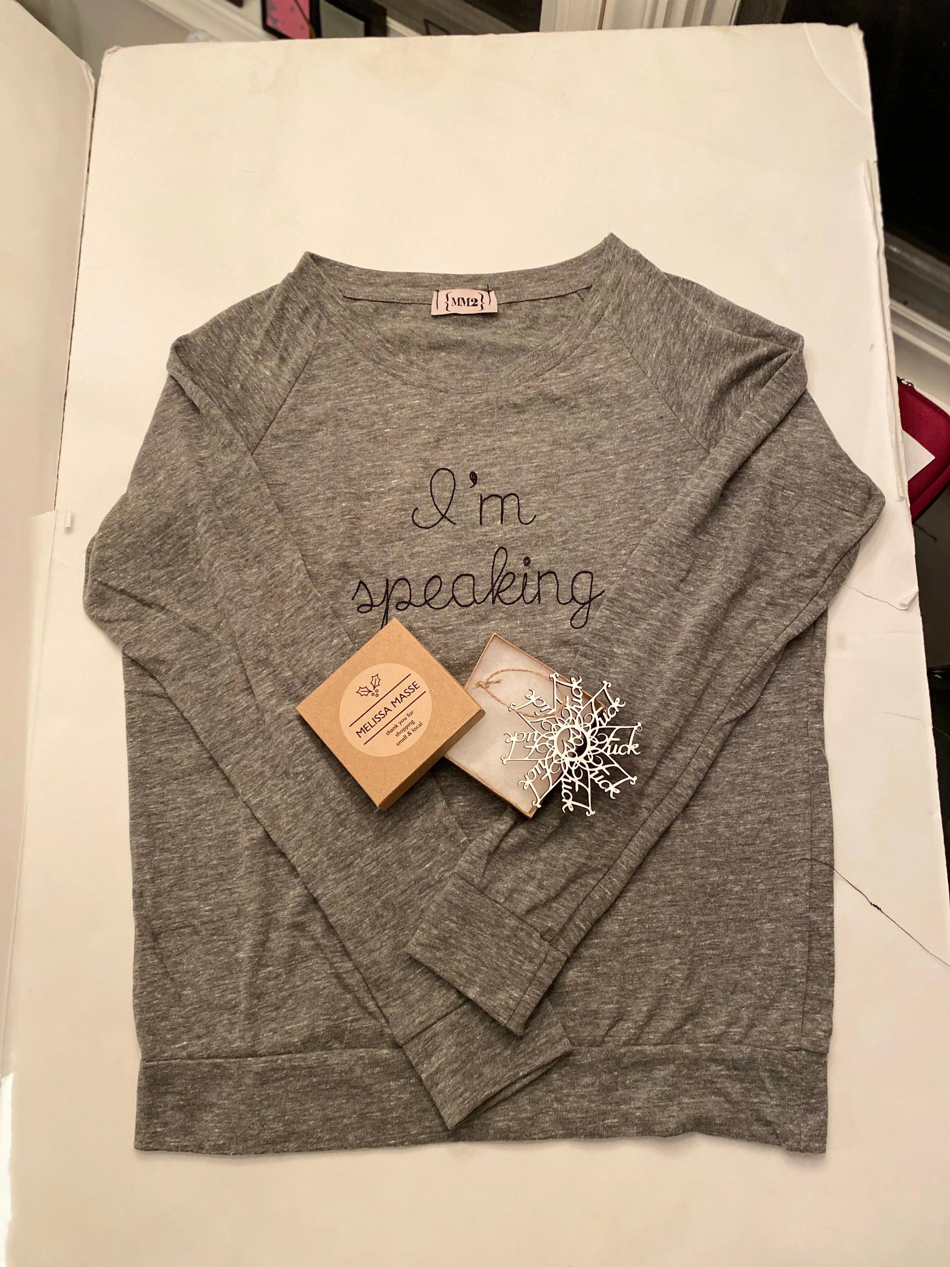 I’m speaking embroidered raglan organic sweatshirt